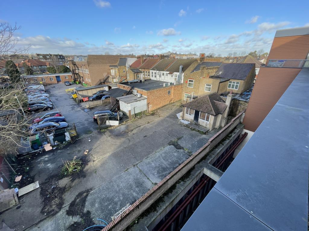 Lot: 9 - MIXED USE FREEHOLD REDEVELOPMENT OPPORTUNITY WITH PLANNING APPROVAL - Whole site view from rear with planning approval